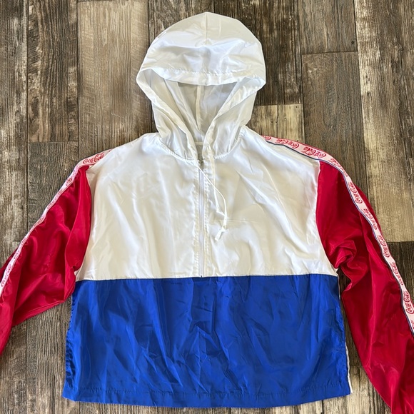 Coca-Cola Women or men
Windbreaker Jacket Size 2XL
Lightweight Pullover hood - Picture 3 of 15